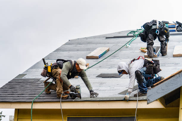 Professional Roofing technician working in Grass Valley, OR
